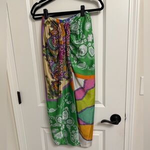 Women’s Zara printed colorful satin midi skirt with front slit. Size XS.